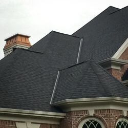 multi-pitch roof by Grace Roofing